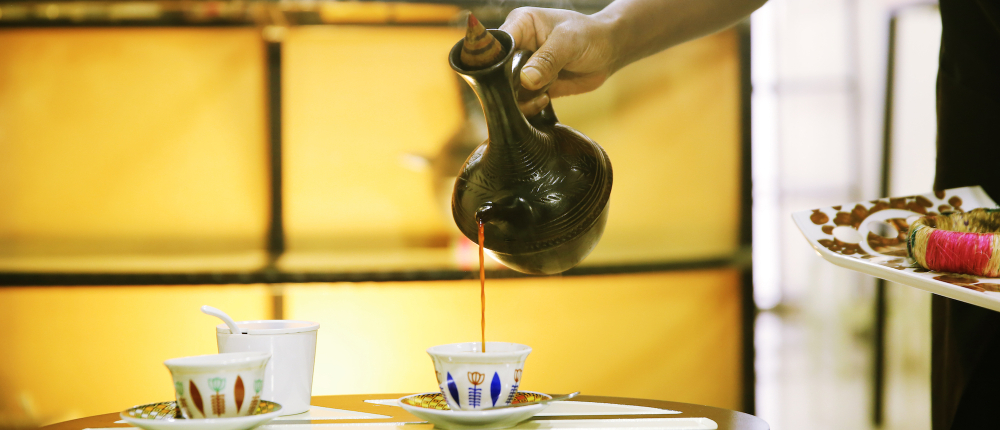 Barista serving turkey coffee in ceramic cups